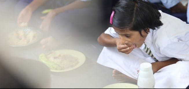 Students at the mid-day meal